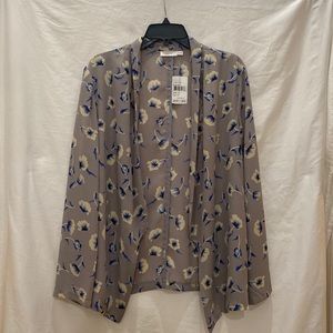 Brand new, never worn light blazer perfect for spring and summer.